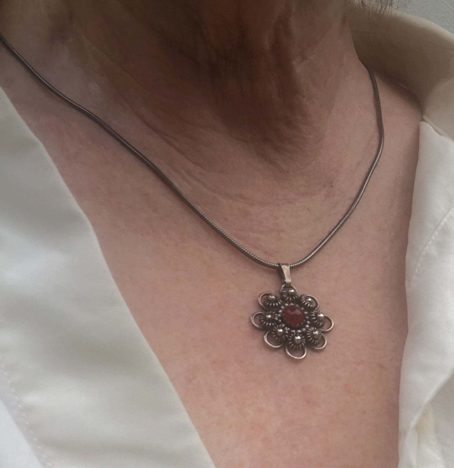 Zeeland Knot Pendant with Carnelian • Handmade Silver Jewelry with Meaning