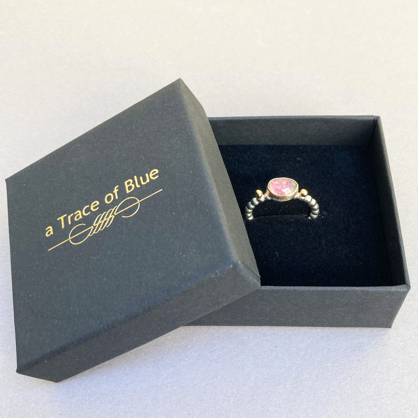 Stacking ring in silver and gold with watermelon tourmaline
