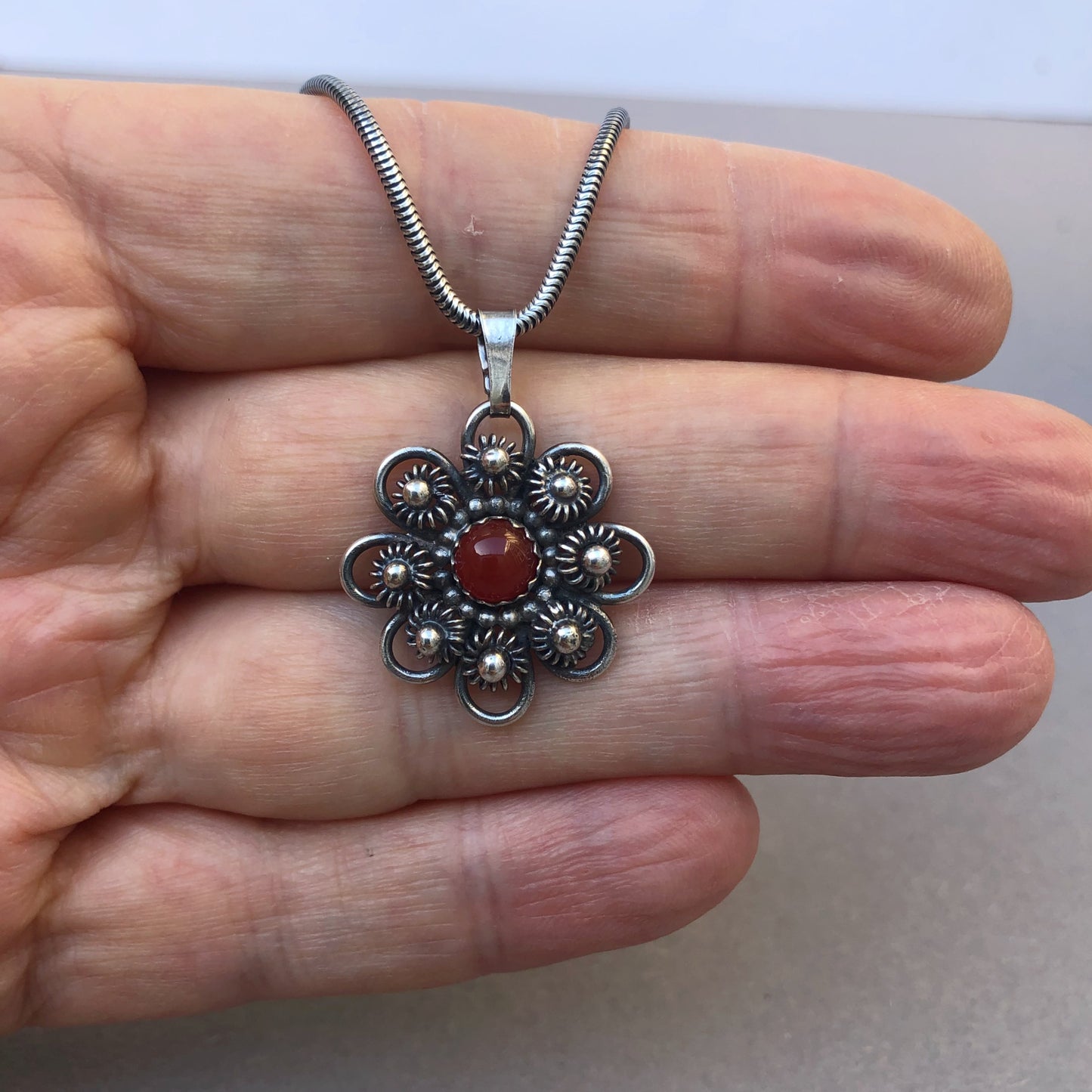 Zeeland Knot Pendant with Carnelian • Handmade Silver Jewelry with Meaning