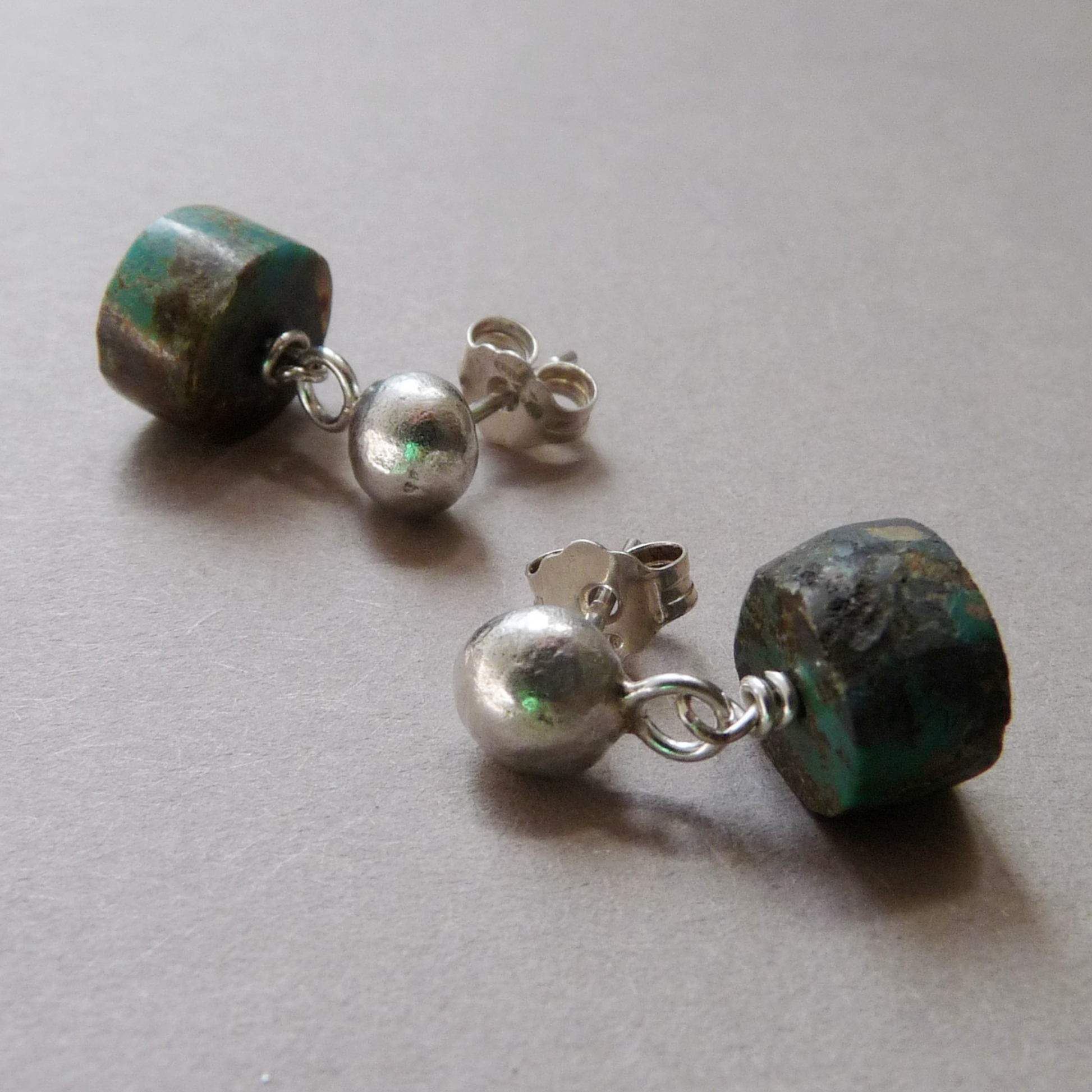 turquoise heren oorknopjes zilver voorzijde