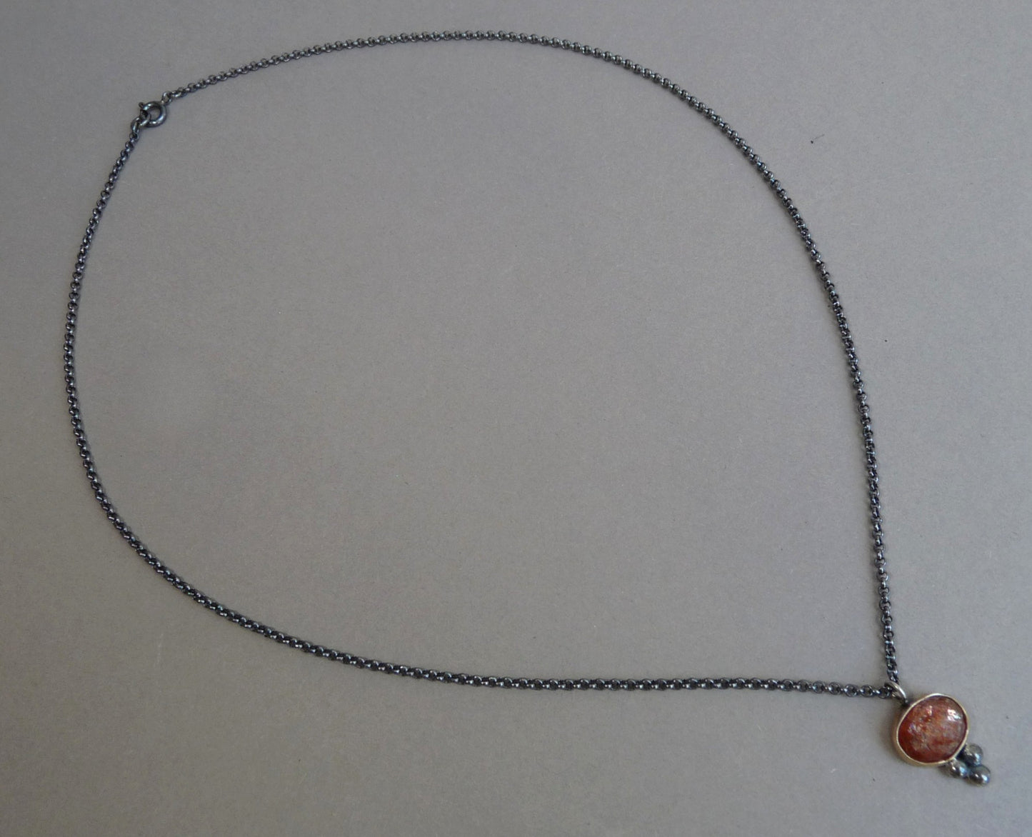 Goud en zilveren ketting met Zonnesteen hanger