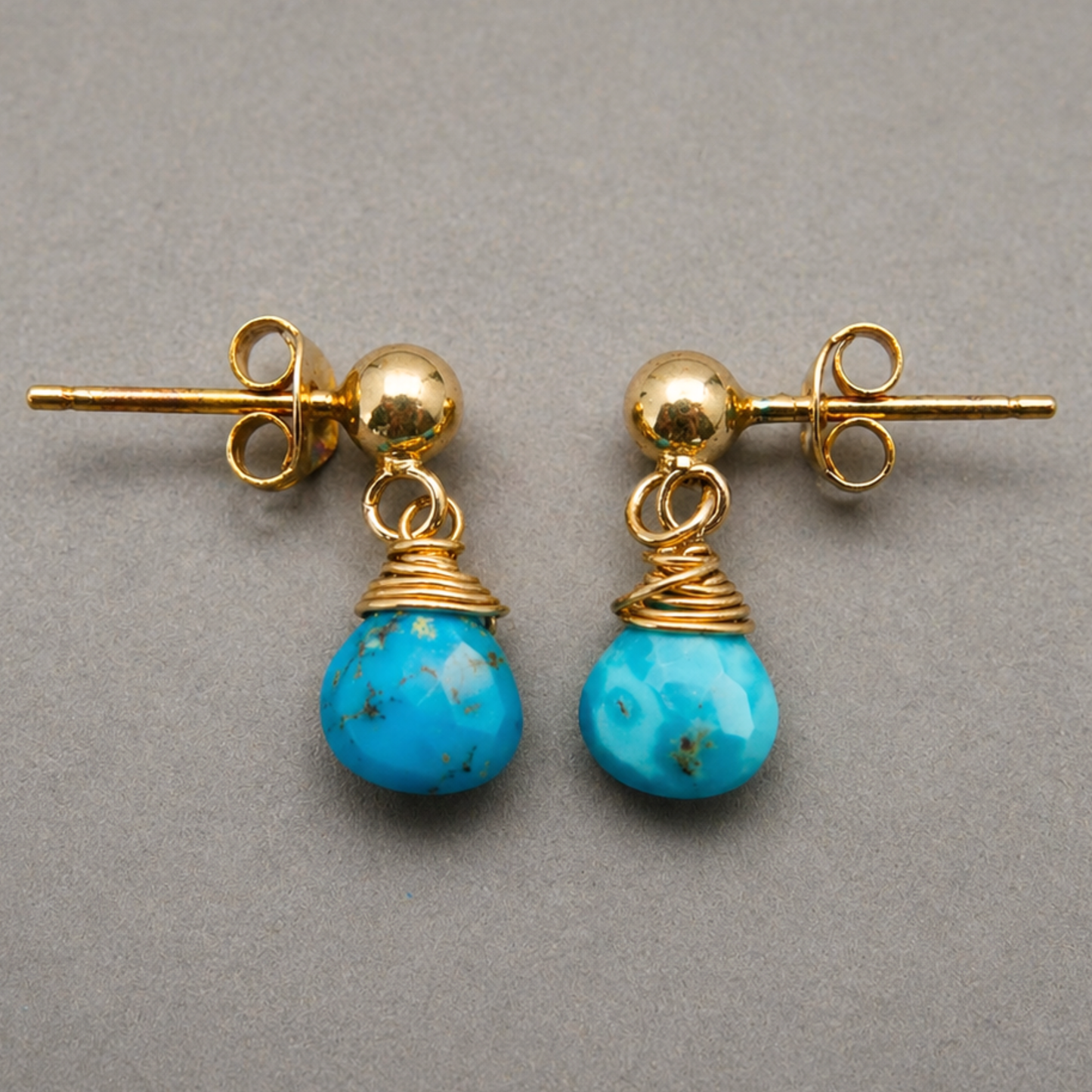 Gold-filled stud earrings with a turquoise droplet