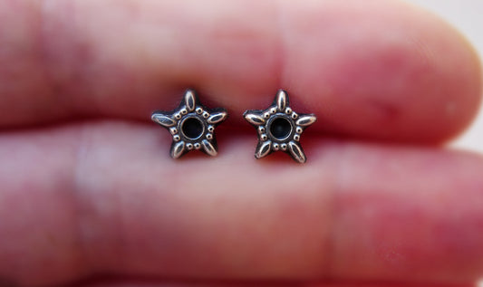 Men's silver star stud earrings