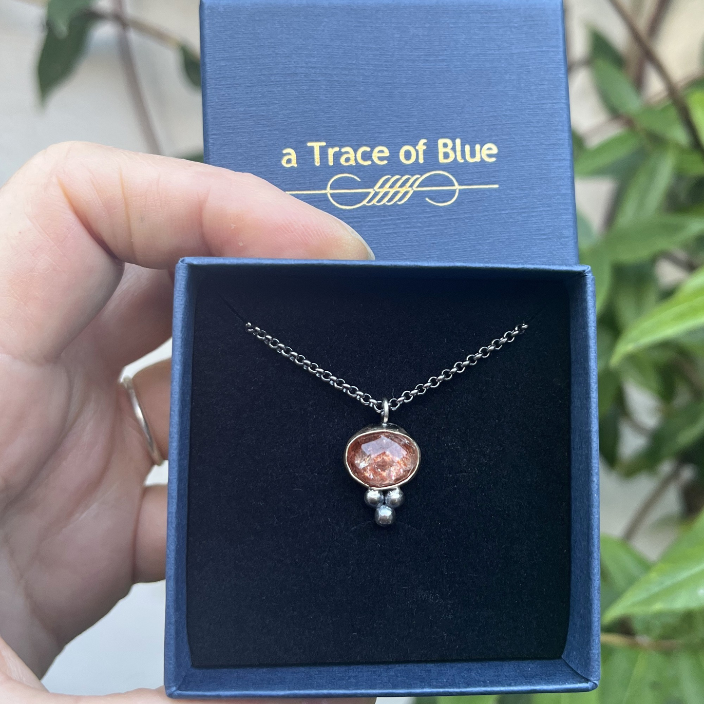 Goud en zilveren ketting met Zonnesteen hanger