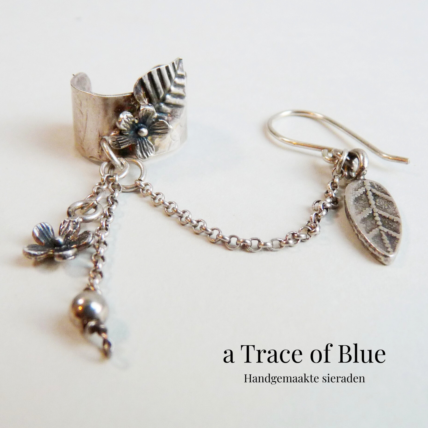 Silver ear cuff with chain and earring 