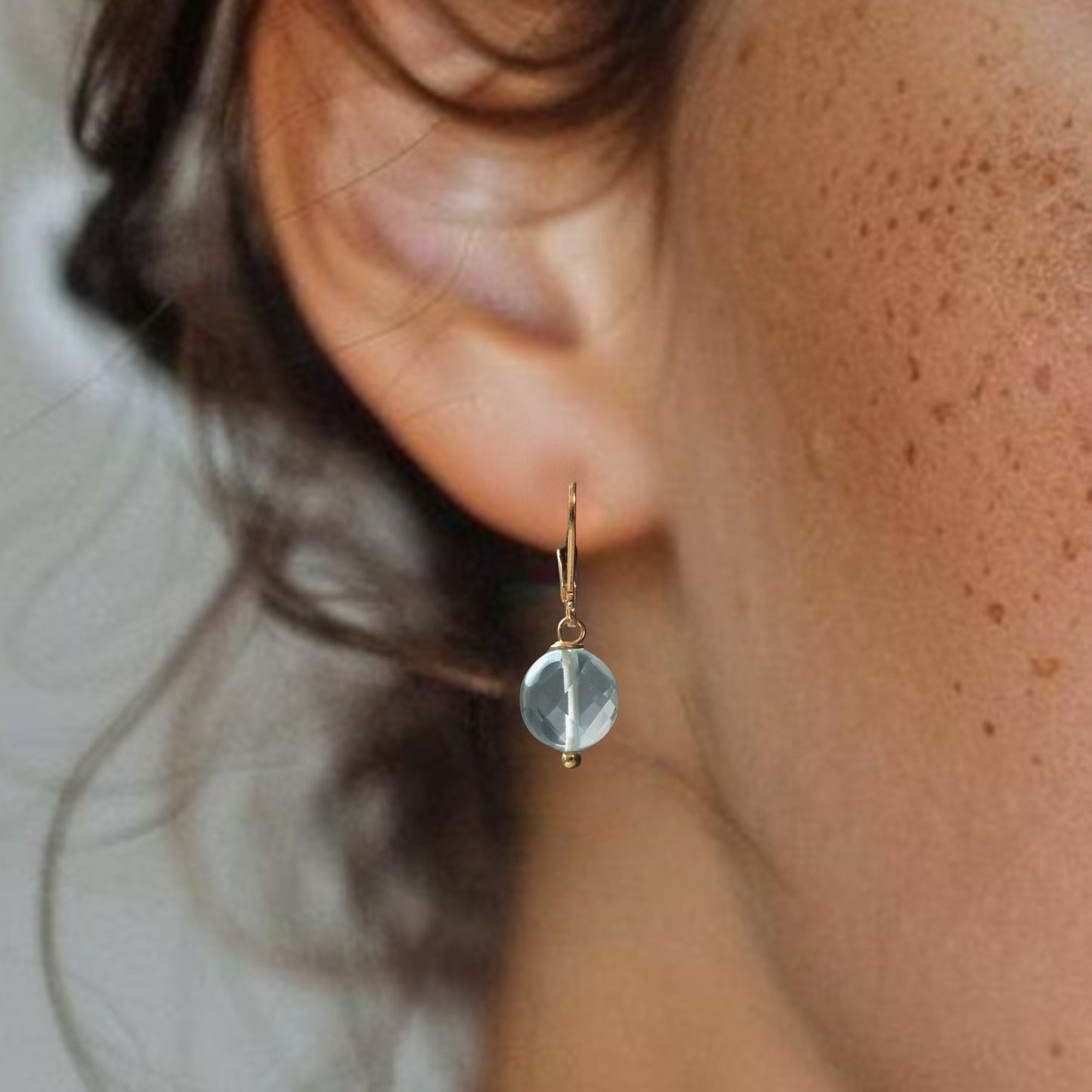 Gouden oorbellen met Aquamarijn muntjes