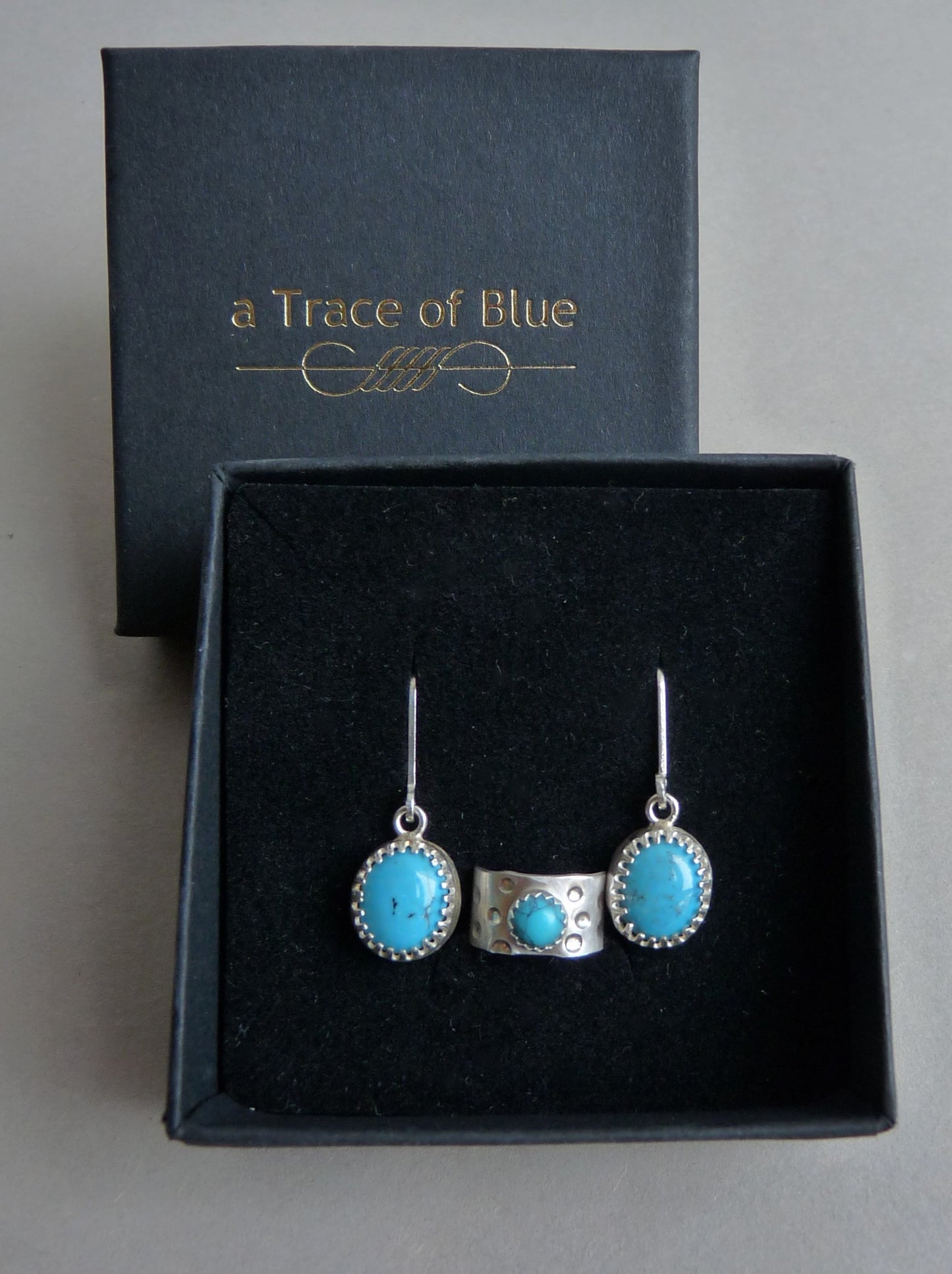 Silver men's ear cuff with Turquoise