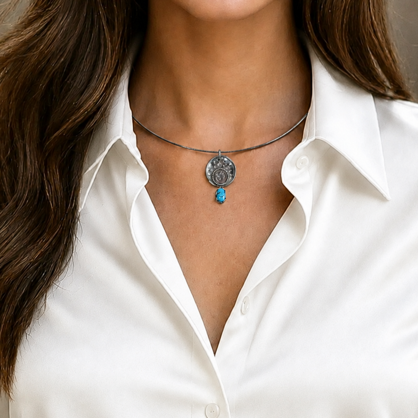 Zilveren ketting met turquoise hanger en Om-teken