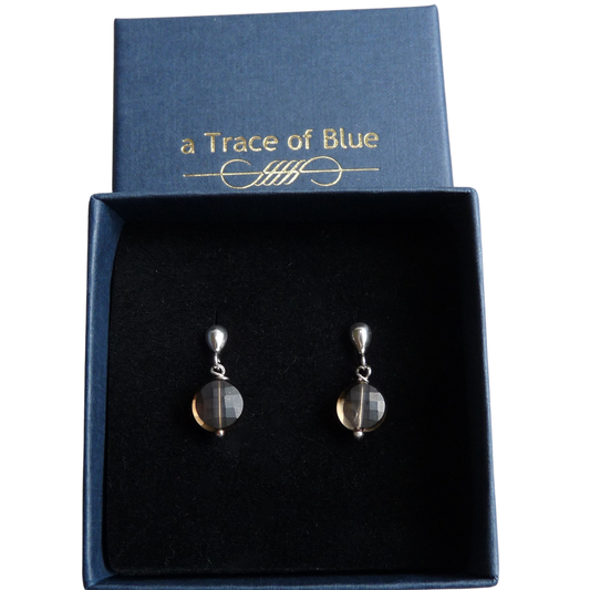 Zilveren knopjes oorbellen met Rookkwarts