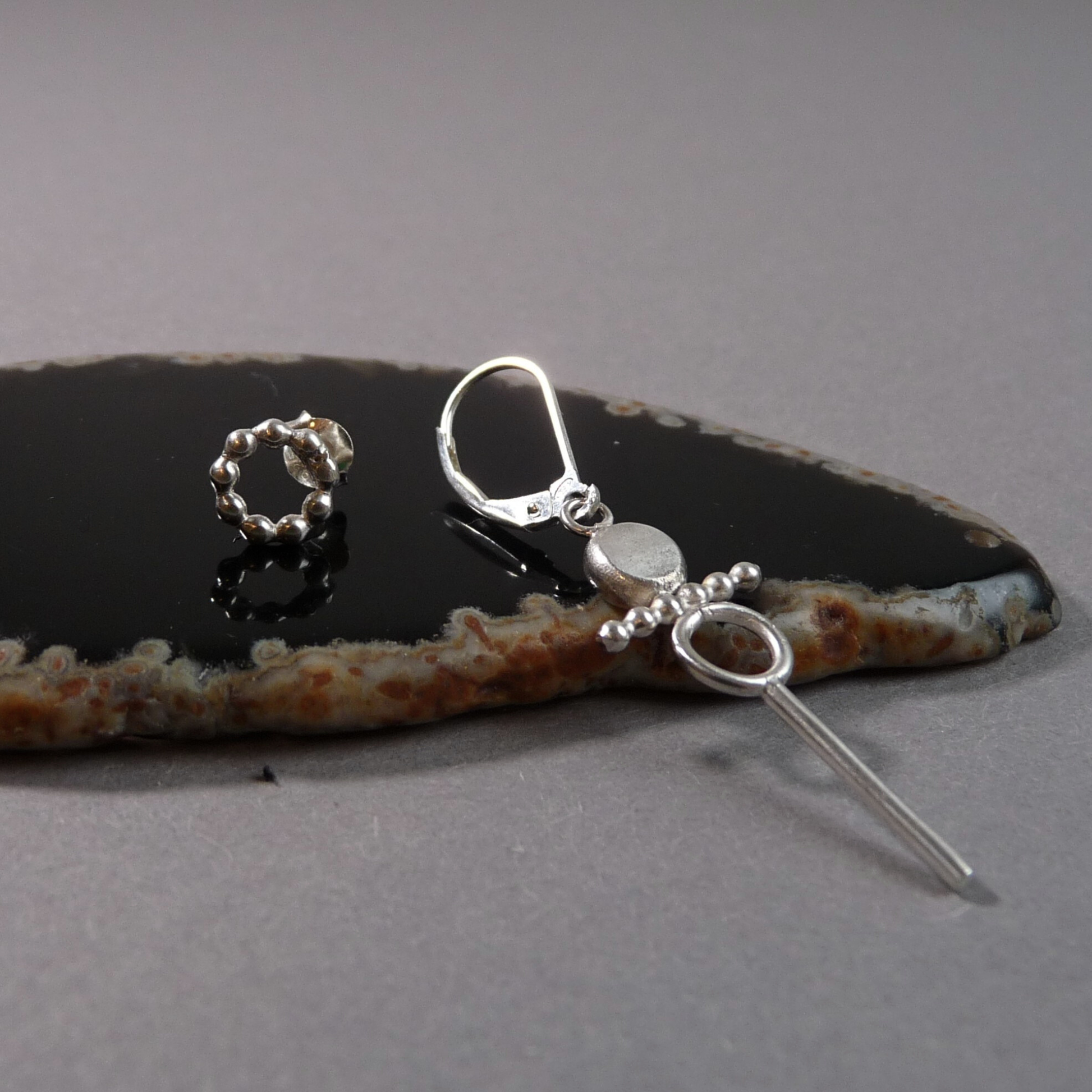 zilveren-oorknopje-heren-opengewerkt-7mm